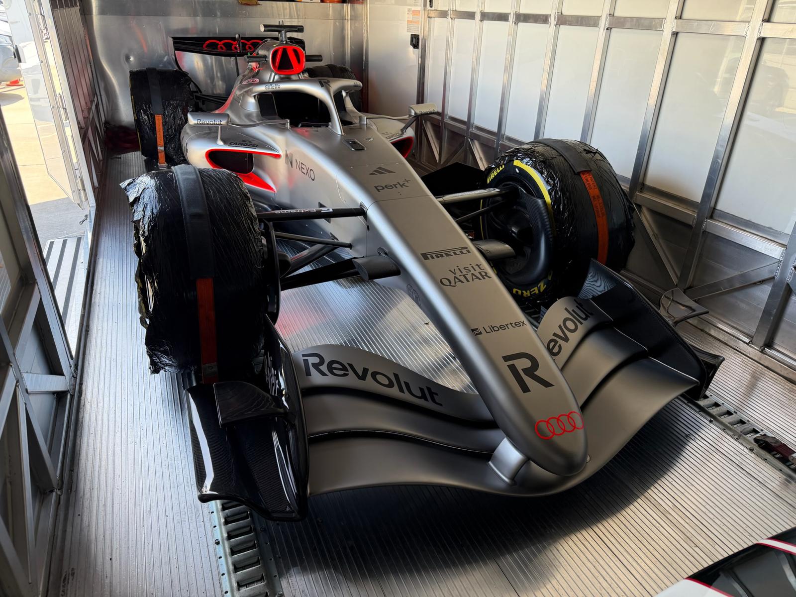Formula 1 car inside enclosed trailer