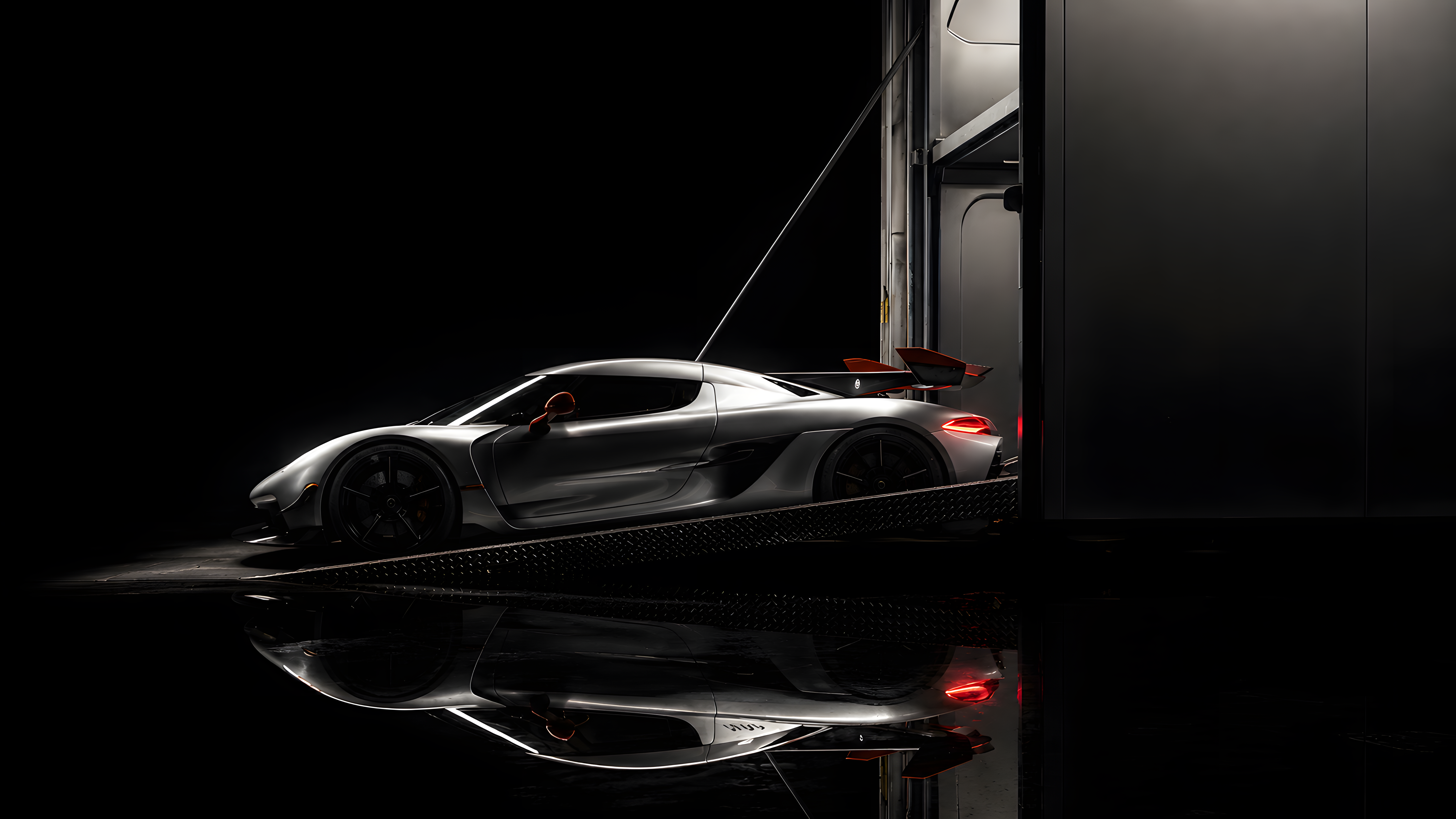 Koenigsegg Jesko being loaded into enclosed transport at night
