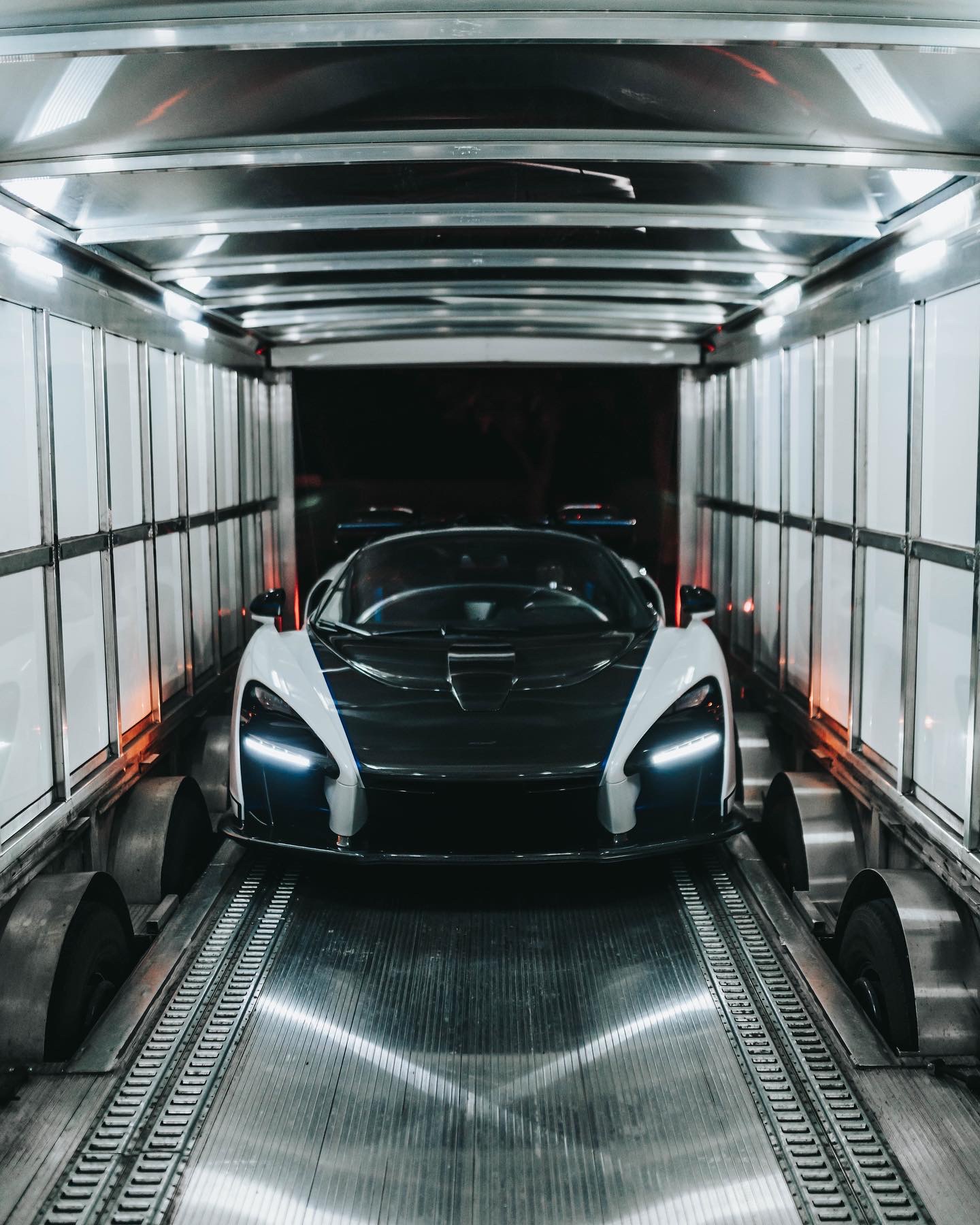McLaren Senna front view inside enclosed transport trailer